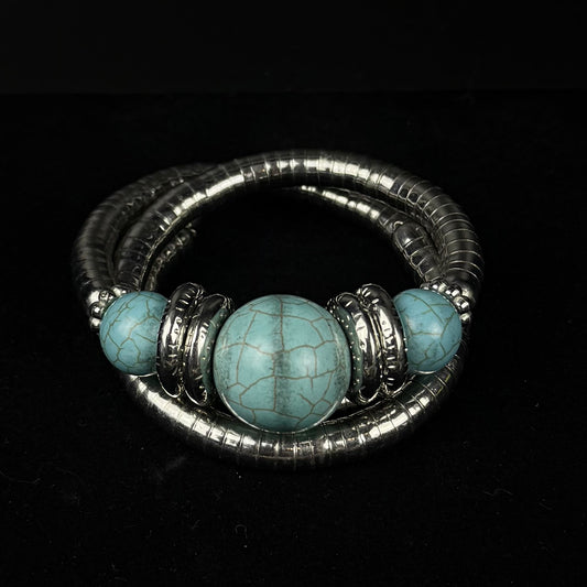 Statement armbånd med turkisfarvede og sølvfarvede detaljer