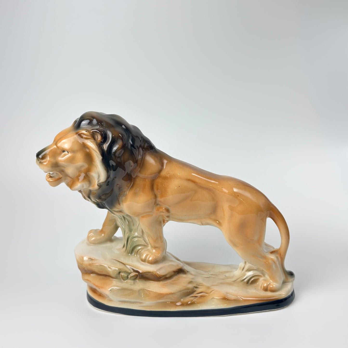 Løve i porcelænsfigur, mrk. nr. 9299, vintage fra 1930-1940'erne