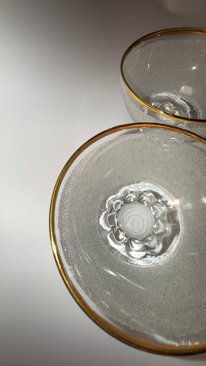 A set of vintage coupe glasses / dessert glasses with rough granulated glass surface and gold rim