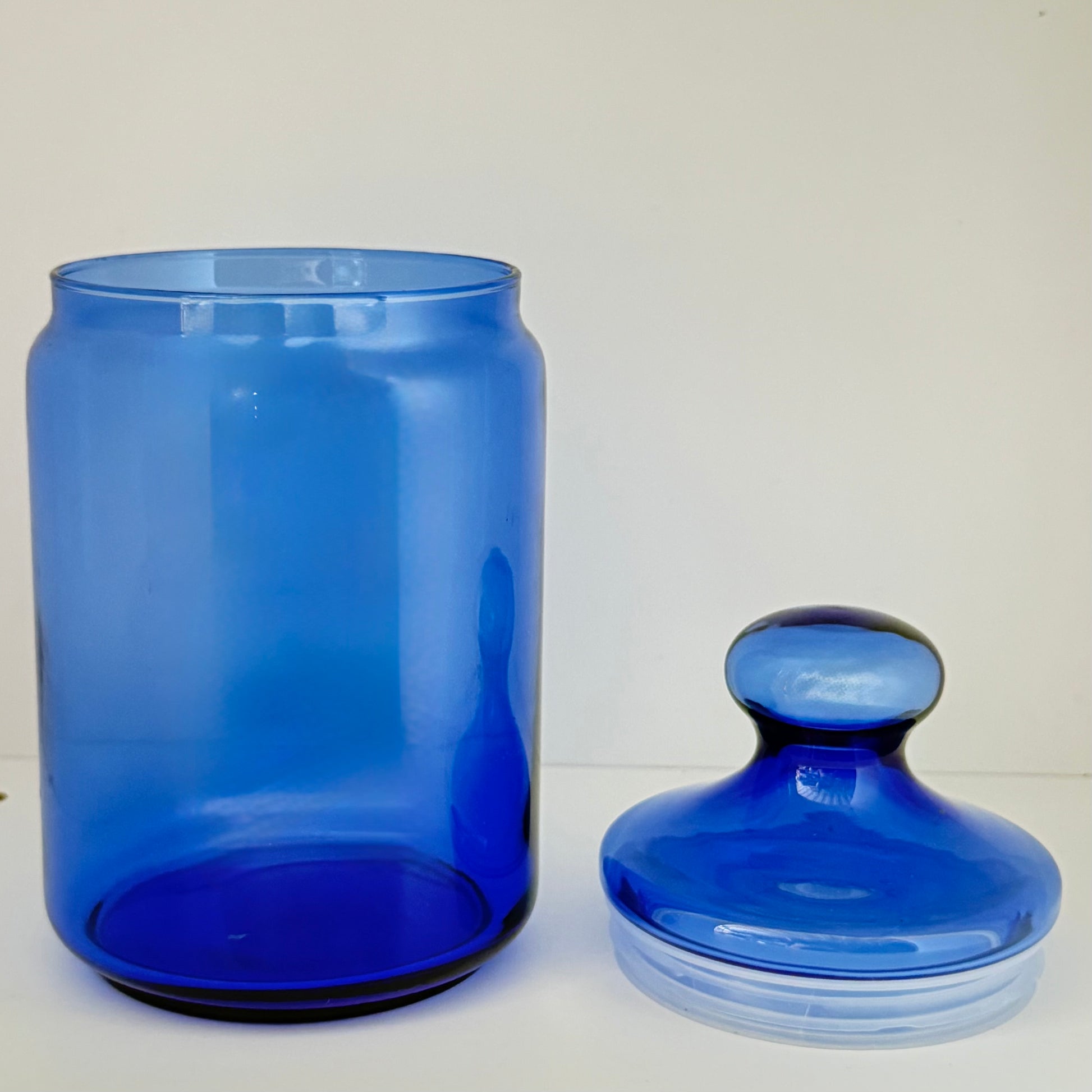 Opbevaringskrukke i koboltblåt glas med låg