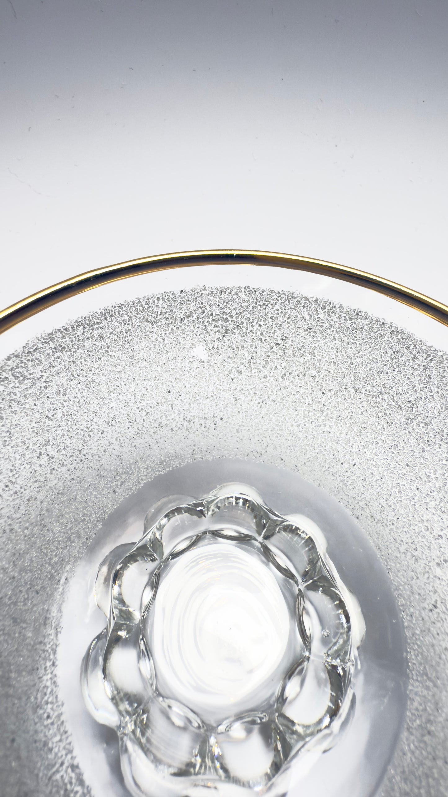 A set of vintage coupe glasses / dessert glasses with rough granulated glass surface and gold rim