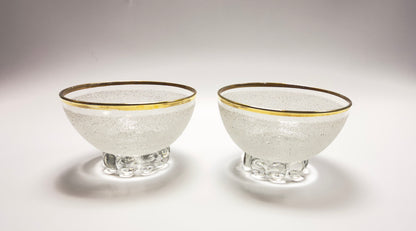 A set of vintage coupe glasses / dessert glasses with rough granulated glass surface and gold rim