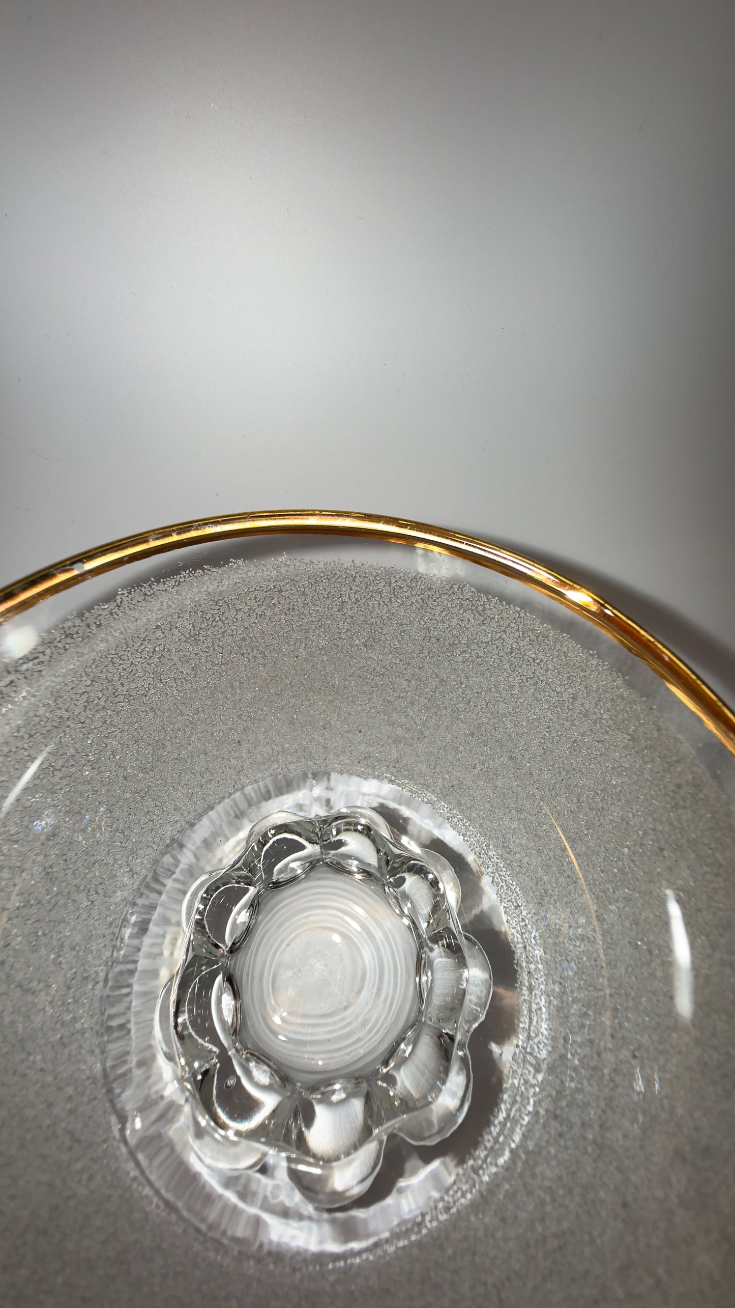 A set of vintage coupe glasses / dessert glasses with rough granulated glass surface and gold rim