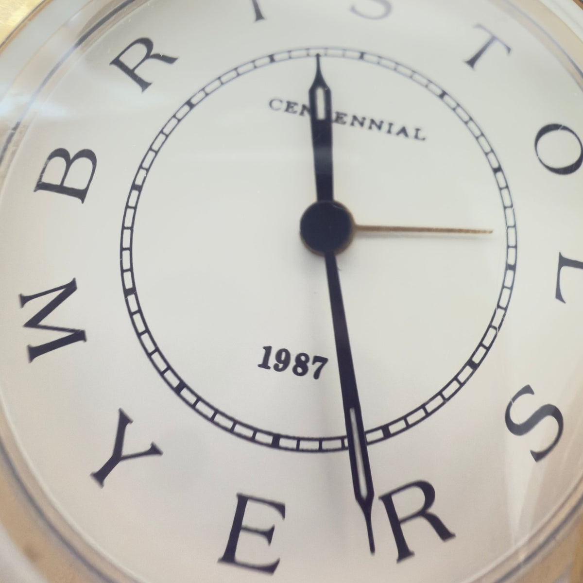 Bristol-Myers Centennial 1987 bordur/rejseur med alarm – firmamemorabilia - Frøken Lilly