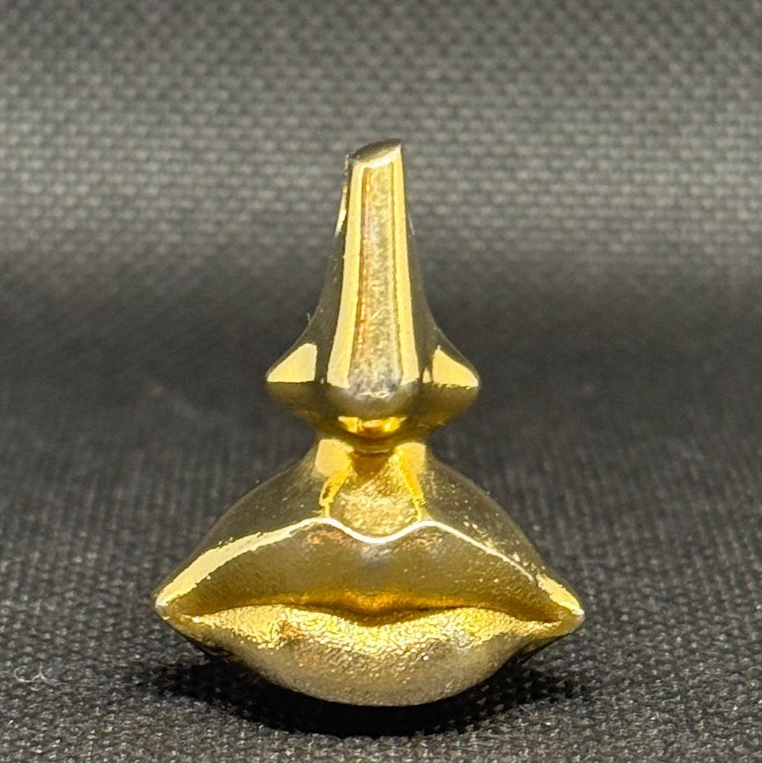 Salvador Dalí messingvedhæng + Laguna Eau de Toilette 1998 - Frøken Lilly