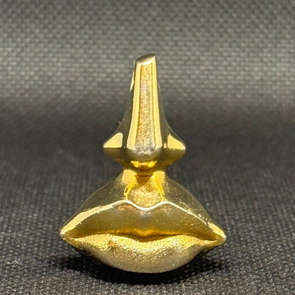 Salvador Dalí messingvedhæng + Laguna Eau de Toilette 1998 - Frøken Lilly