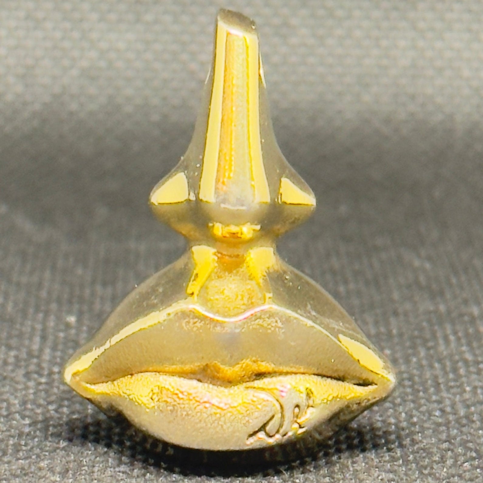 Salvador Dalí messingvedhæng + Laguna Eau de Toilette 1998 - Frøken Lilly