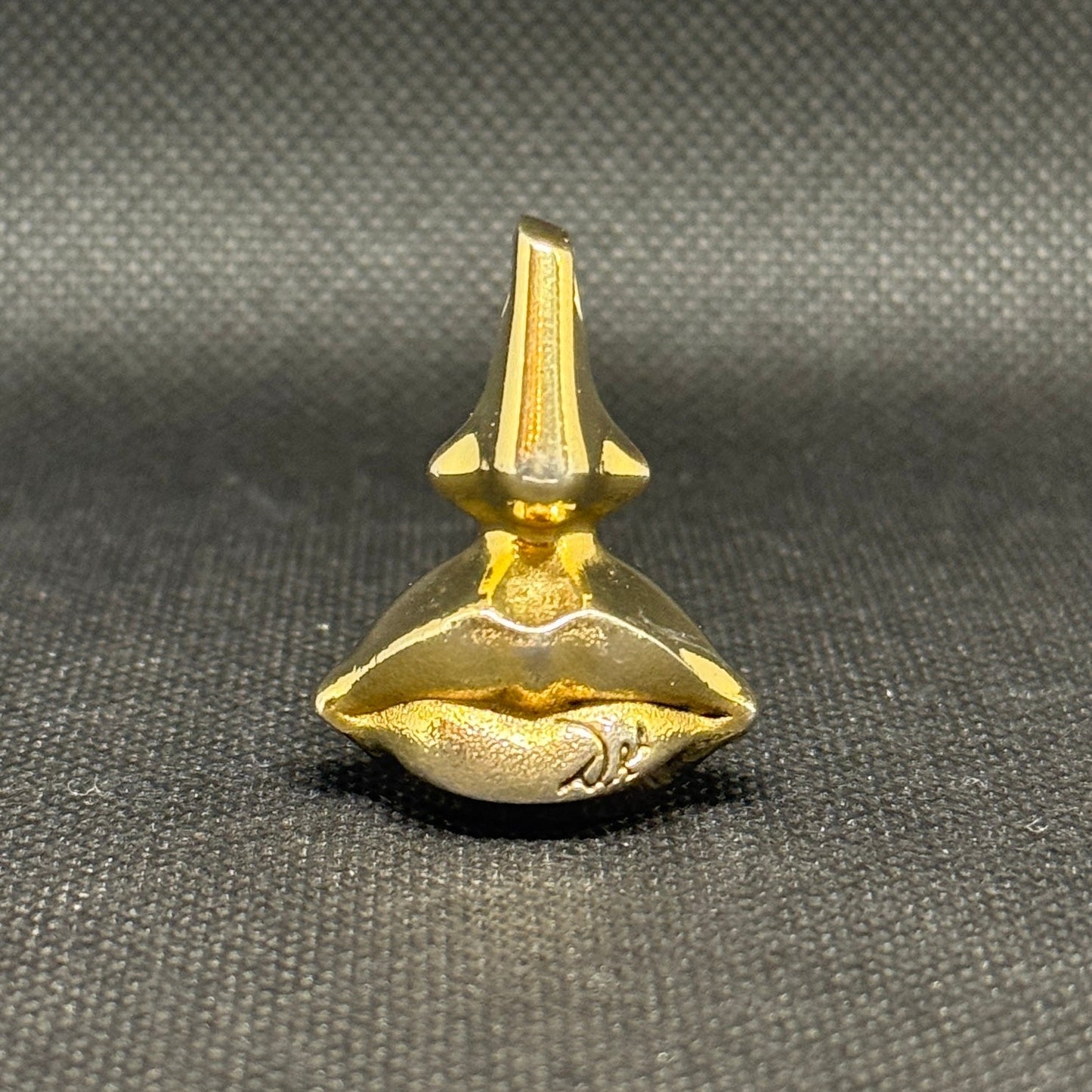 Salvador Dalí messingvedhæng + Laguna Eau de Toilette 1998 - Frøken Lilly