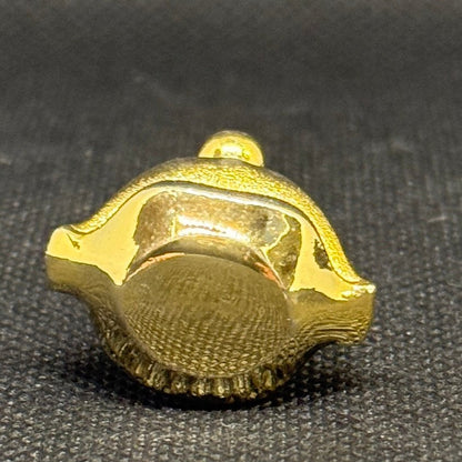 Salvador Dalí messingvedhæng + Laguna Eau de Toilette 1998 - Frøken Lilly